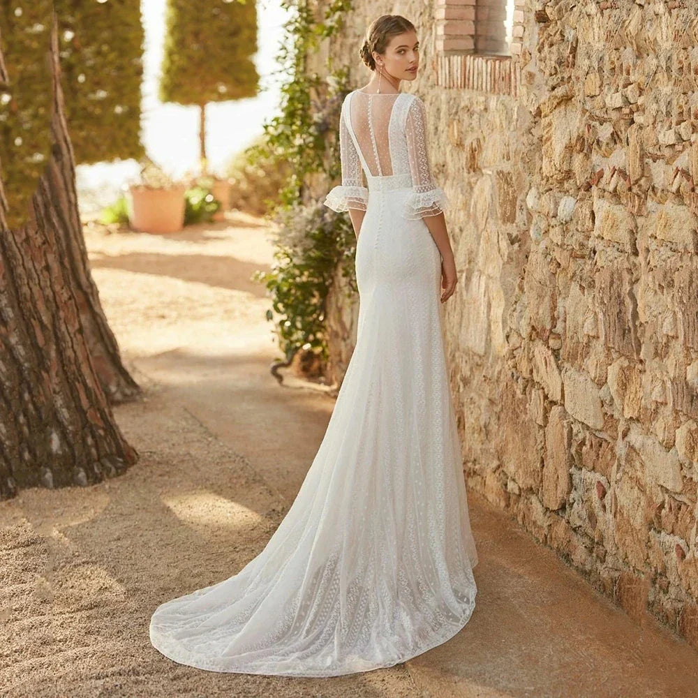 Robe de mariée sirène élégante en dentelle bohème sexy décolleté plongeant en V manches courtes, robe de mariée formelle à boutons de nacre pour une soirée plage en tulle