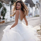 Elegant Spaghetti Straps Ball Gown Wedding Dresses Backless Robe de Mariage Delicate Beaded Ruffles Bridal Gown