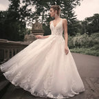 Vestidos de novia elegantes para mujer, populares en verano, corte en A, escote en V, sin mangas, apliques, espalda descubierta. 