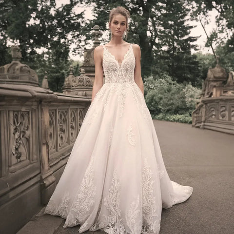 Vestidos de novia elegantes para mujer, populares en verano, corte en A, escote en V, sin mangas, apliques, espalda descubierta. 