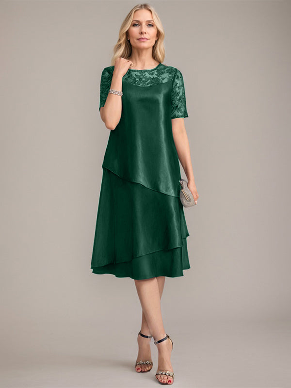 Vestido de corte A, escote redondo, largo hasta la rodilla, para la madre de la novia, con apliques y lentejuelas. 