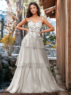 Vestido de fiesta con volantes y vendaje ilusión con bordado floral 3D