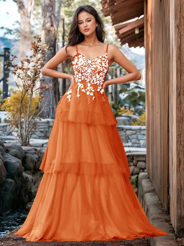 Vestido de fiesta con volantes y vendaje ilusión con bordado floral 3D