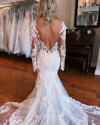 Magnifique robe de mariée sirène longue dos nu en dentelle avec décolleté en V et traîne amovible