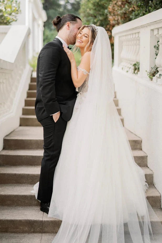 Robe de mariée en tulle coupe A, décolleté cœur, ornée de perles, modèle WD678