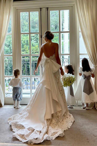 Vestido de novia bohemio color marfil, corte en A, sin tirantes, con encaje floral y pajarita de satén WD634