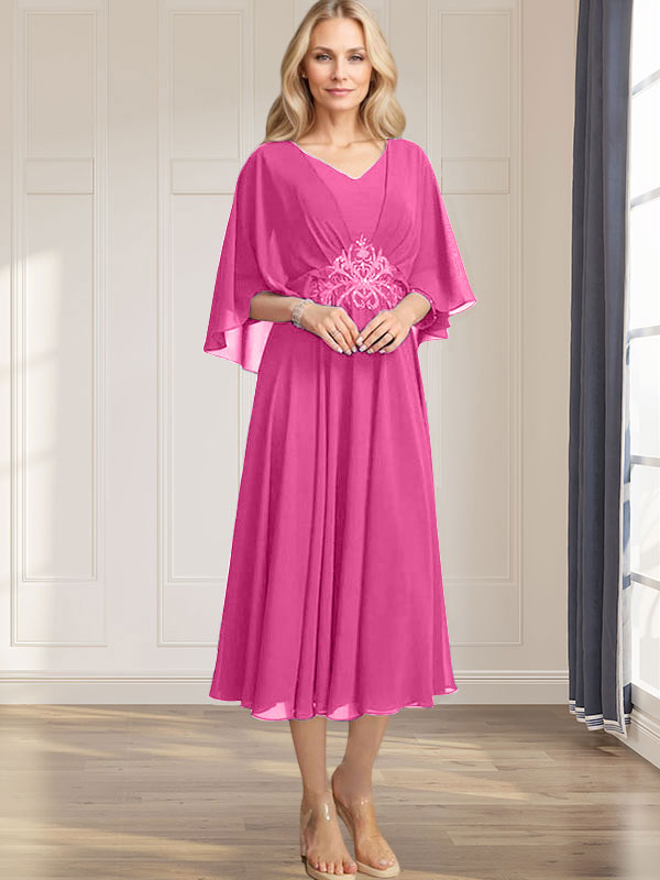 Robe de mariée trapèze en mousseline de soie, longueur thé, col en V, ornée de sequins plissés, d'appliques de dentelle et de perles. 