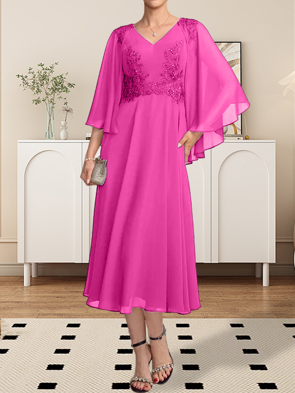 Vestido de corte A, escote en V, largo hasta la rodilla, de gasa, encaje, con lentejuelas y pedrería para la madre de la novia.