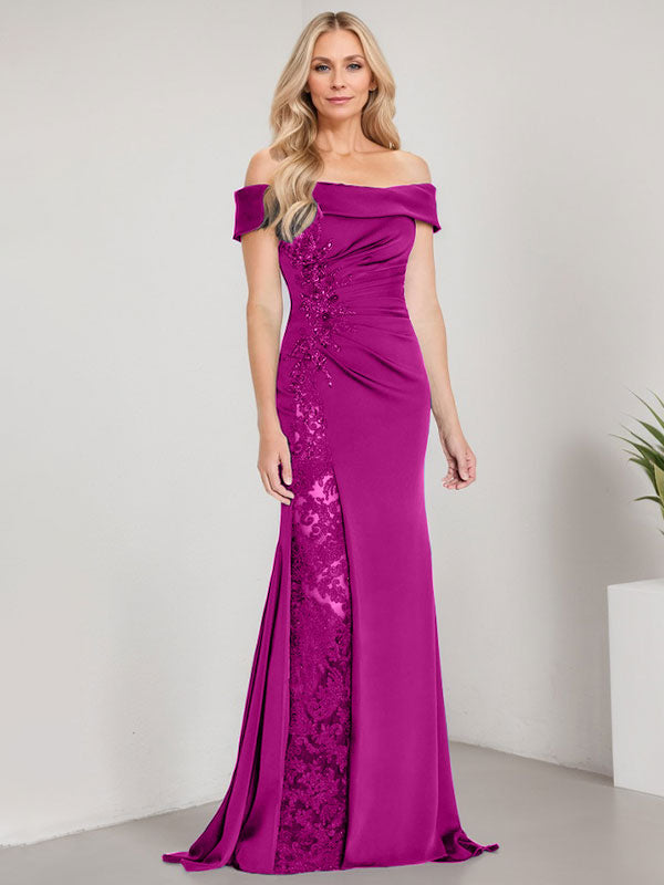 Vestido de corte sirena para la madre de la novia, largo hasta el suelo, con hombros descubiertos, apliques y pedrería, con abertura alta. 
