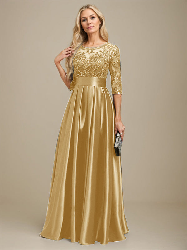 Robe de mariée longue en satin stretch dentelle et dentelle, coupe trapèze, décolleté illusion, ornée d'un nœud à sequins 