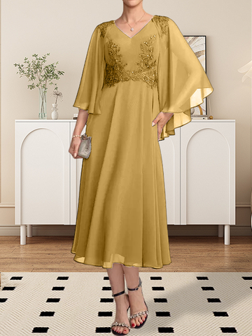 Vestido de corte A, escote en V, largo hasta la rodilla, de gasa, encaje, con lentejuelas y pedrería para la madre de la novia.