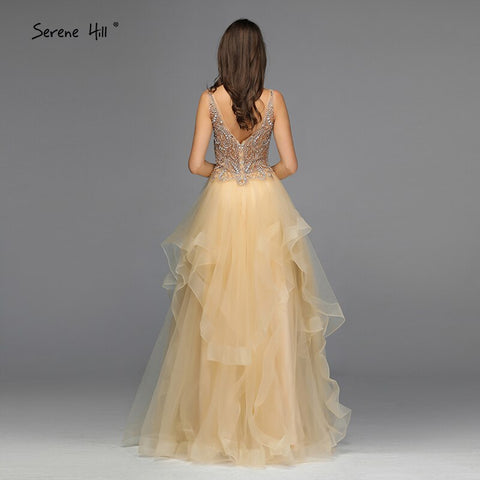 Robe de soirée en or, col en V, perles et diamants, coupe trapèze, sans manches, sexy, modèle 2025 LA70149. 