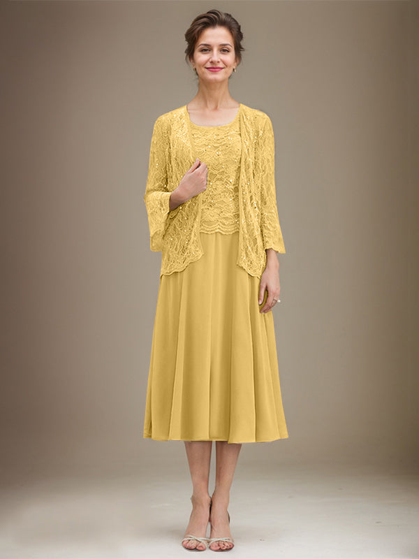 Vestido de novia de corte línea A, escote redondo, largo hasta la rodilla, de encaje y gasa con lentejuelas. 