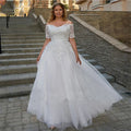 Magnifiques robes de mariée bohèmes à épaules dénudées, grandes tailles, dentelle appliquée, manches courtes, tulle, superbes robes de mariée fascinantes 