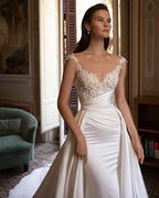 Robe de mariée sirène champêtre somptueuse, surjupe à manches courtes, élégantes applications de dentelle, satin et tourbe.