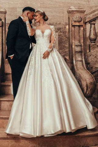 Preciosos vestidos de novia de corte princesa, corte A, satén y encaje, con mangas largas.