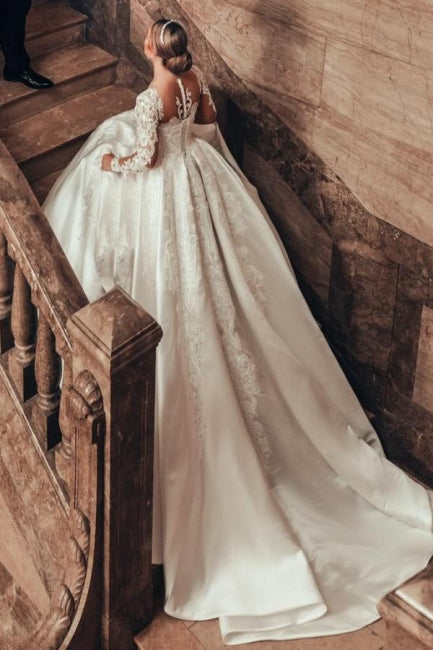 Preciosos vestidos de novia de corte princesa, corte A, satén y encaje, con mangas largas.