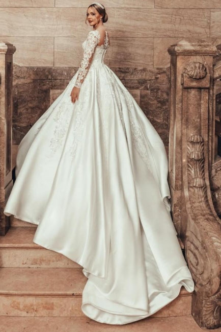 Preciosos vestidos de novia de corte princesa, corte A, satén y encaje, con mangas largas.