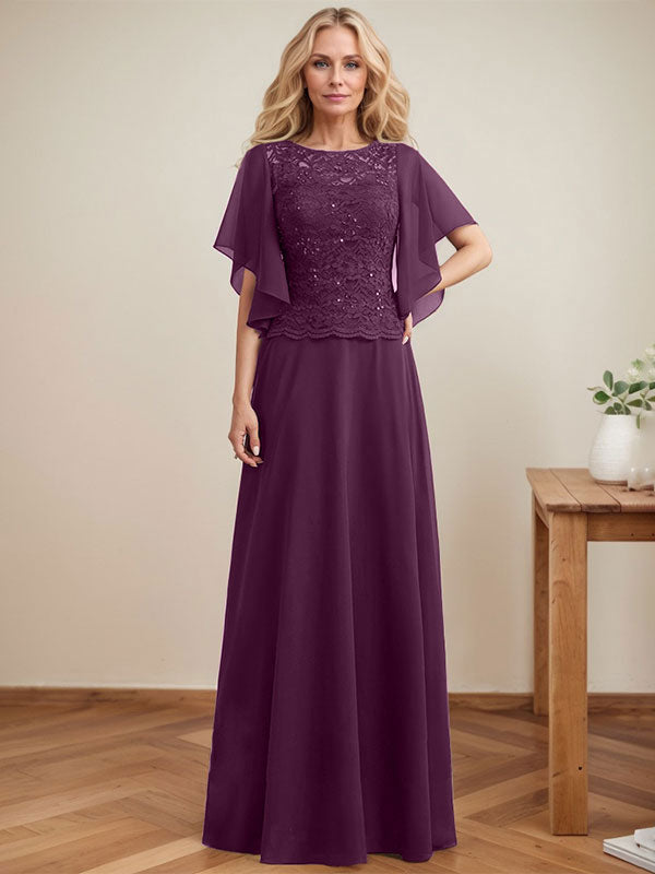 Vestido de novia de corte A, escote redondo, ilusión, largo hasta el suelo, de encaje y gasa con lentejuelas. 