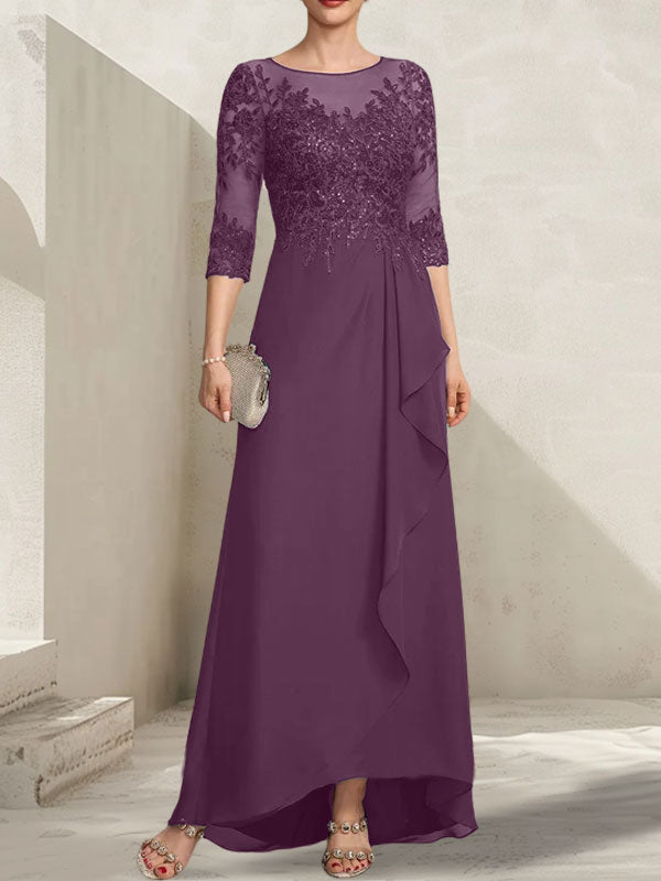 Vestido de madrina de la novia, corte asimétrico, escote ilusión, encaje y gasa, con lentejuelas y volantes en cascada.