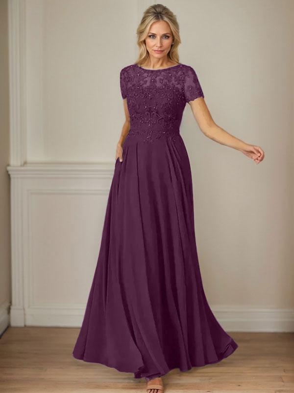 Robe en mousseline de soie bleu marine foncé, coupe trapèze, col bateau et sequins 