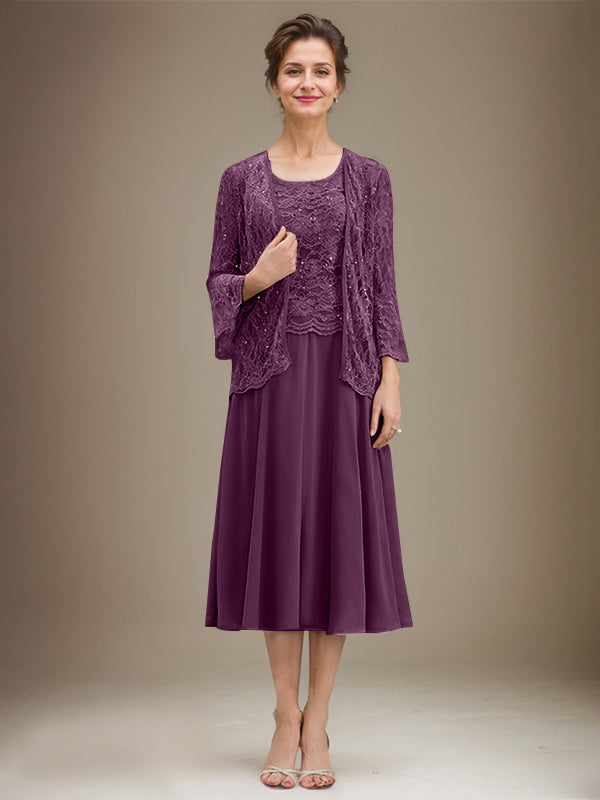 Vestido de novia de corte línea A, escote redondo, largo hasta la rodilla, de encaje y gasa con lentejuelas. 