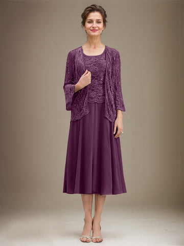 Vestido de novia de corte línea A, escote redondo, largo hasta la rodilla, de encaje y gasa con lentejuelas. 