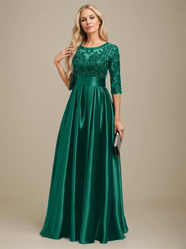 Vestido de madrina de la novia, corte en A, escote ilusión, largo hasta el suelo, satén elástico con encaje y lazo de lentejuelas. 