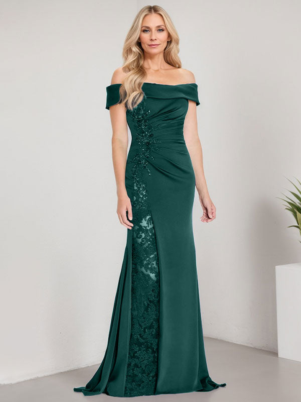 Vestido de corte sirena para la madre de la novia, largo hasta el suelo, con hombros descubiertos, apliques y pedrería, con abertura alta. 