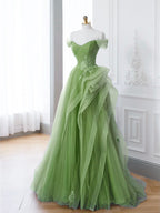 Vestido largo de fiesta de encaje con hombros descubiertos y corte en A