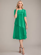 Vestido de corte A, escote redondo, largo hasta la rodilla, para la madre de la novia, con apliques y lentejuelas. 