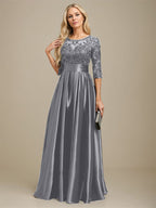 Robe de mariée longue en satin stretch dentelle et dentelle, coupe trapèze, décolleté illusion, ornée d'un nœud à sequins 