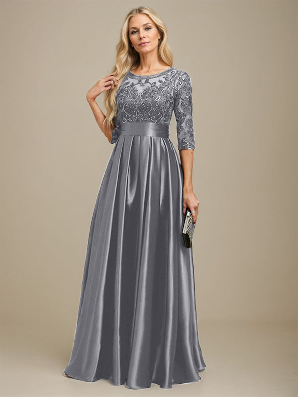 Vestido de madrina de la novia, corte en A, escote ilusión, largo hasta el suelo, satén elástico con encaje y lazo de lentejuelas. 