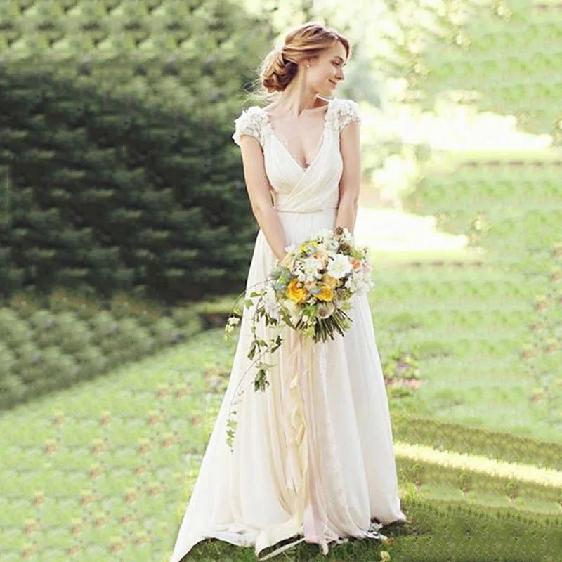 Robe de mariée haute couture blanche à appliques 3D, décolleté en V profond, dos nu, traîne balayée, coupe trapèze, en satin, confection sur mesure 