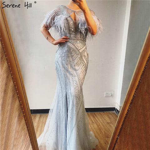 On Sale no return no refundSale Silver Feathers Shawl Yarn Sexy Evening Dresses 2025 Dubai Mermaid V-Neck Beading Diamond Formal Dress LA70355