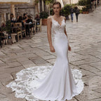 Vestidos de novia de alta calidad con tirantes finos, escote en V, espalda descubierta, apliques de encaje, cola de barrido, corte sirena.