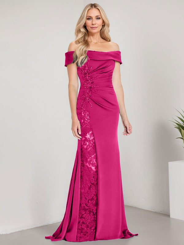 Vestido de corte sirena para la madre de la novia, largo hasta el suelo, con hombros descubiertos, apliques y pedrería, con abertura alta. 