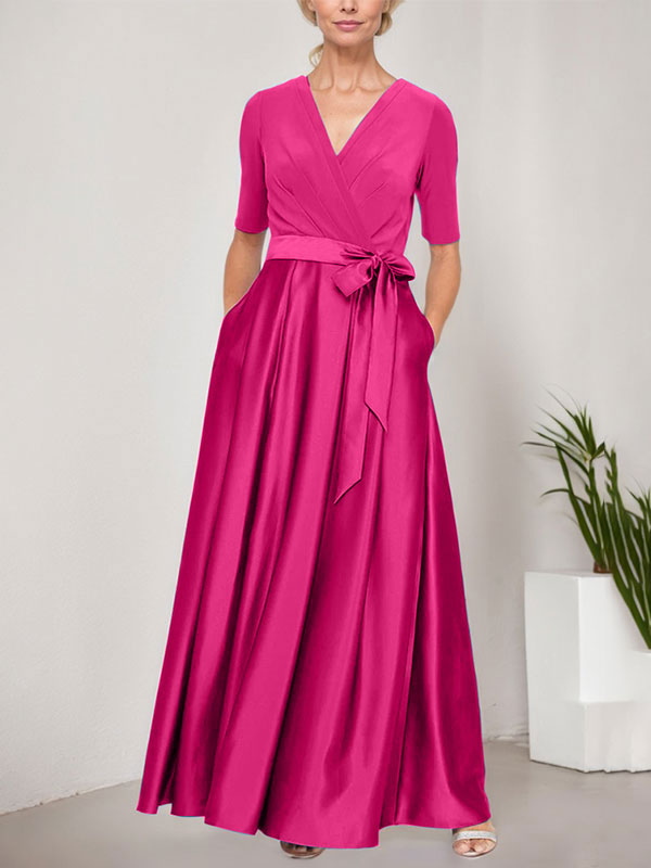 Vestido de baile con escote cruzado, falda amplia de satén y corpiño de jersey. 