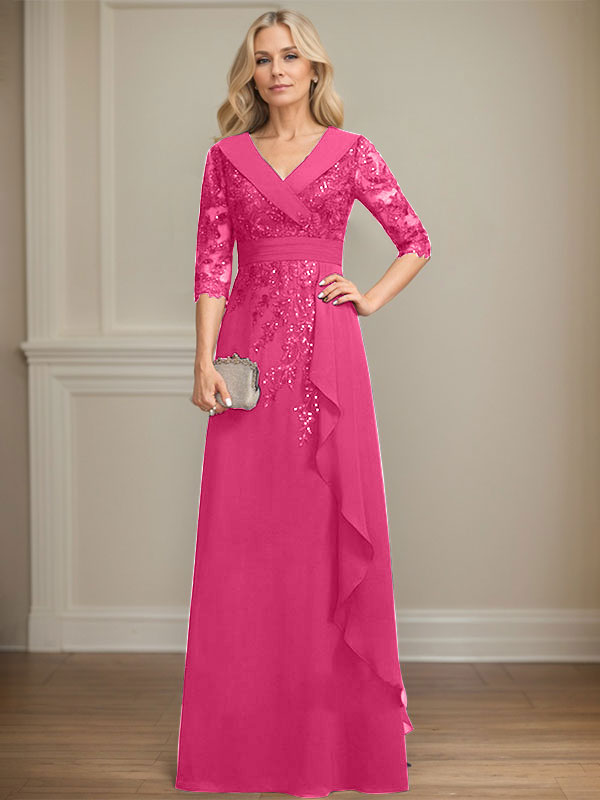 Vestido de novia de corte línea A, cuello en V, largo hasta el suelo, de encaje y gasa, con lentejuelas y volantes en cascada. 
