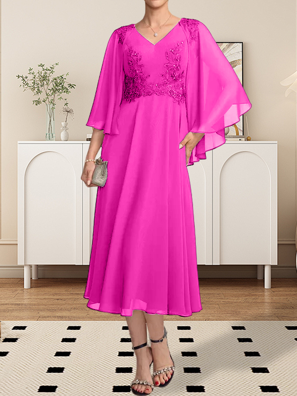 Vestido de corte A, escote en V, largo hasta la rodilla, de gasa, encaje, con lentejuelas y pedrería para la madre de la novia.