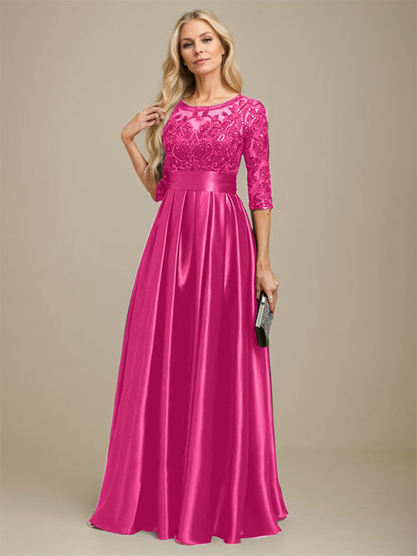 Vestido de madrina de la novia, corte en A, escote ilusión, largo hasta el suelo, satén elástico con encaje y lazo de lentejuelas. 