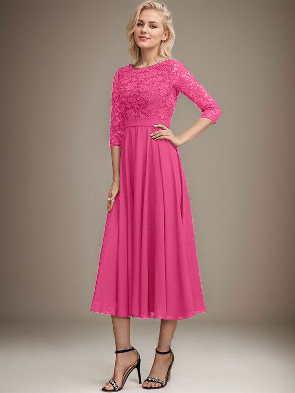 Vestido de novia de corte línea A, escote redondo, largo hasta la rodilla, de encaje y gasa con lentejuelas.