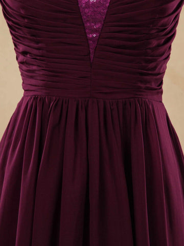 Robe de soirée trapèze en mousseline de soie à col en V et bretelles dos en V avec décolleté pailleté 