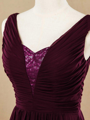 Robe de soirée trapèze en mousseline de soie à col en V et bretelles dos en V avec décolleté pailleté 