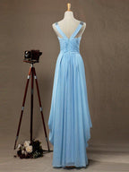 Robe de soirée longue en mousseline de soie, coupe fourreau/colonne, col en V, avec drapé latéral et perles croisées 