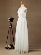 Vestido de dama de honor de tul transparente con pliegues y escote joya en forma de A hasta el suelo 