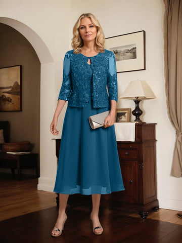 Vestido de novia de corte línea A, escote redondo, largo hasta la rodilla, de encaje y gasa con lentejuelas. 