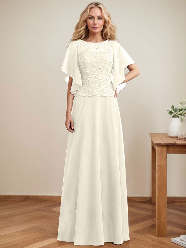 Vestido de novia de corte A, escote redondo, ilusión, largo hasta el suelo, de encaje y gasa con lentejuelas. 
