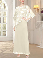 Robe longue en maille pailletée avec corsage asymétrique original 