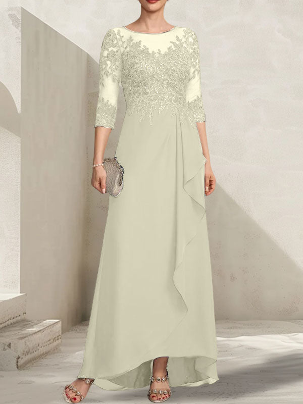 Vestido de madrina de la novia, corte asimétrico, escote ilusión, encaje y gasa, con lentejuelas y volantes en cascada.